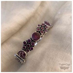 Ruby flower pattern silver bangle.