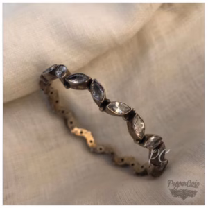Petal silver bangle.