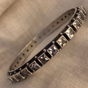 White cut stone Bangle.