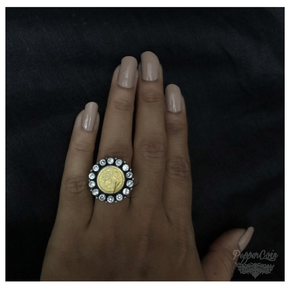 A regular gold coin ring is ornamented with diamonds. Its fine  craftsmanship and the art of fine jewellery a… | Gold coin ring, Gold coin  jewelry, Gold ring designs