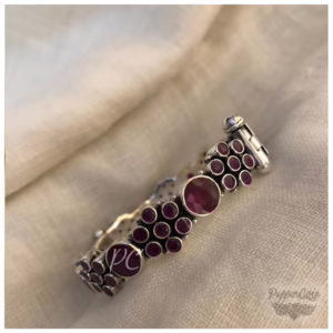 Ruby flower pattern silver bangle.
