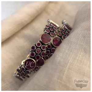 Ruby flower pattern silver bangle.