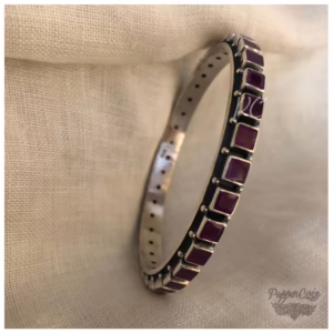 Ruby cut stone bangle.
