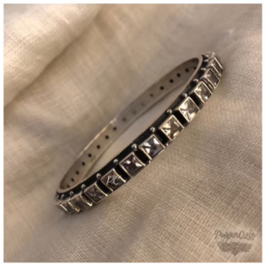 White cut stone Bangle.